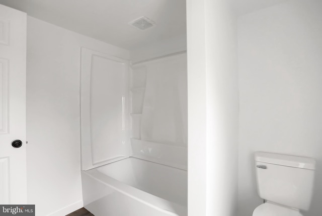 bathroom featuring toilet