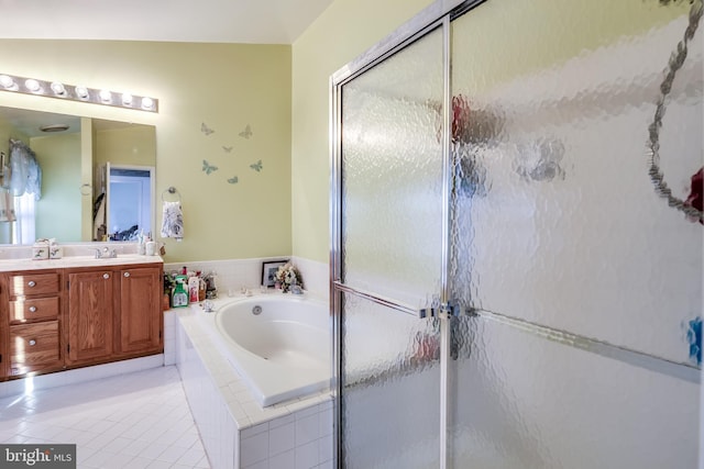 bathroom with vanity, tile patterned floors, and separate shower and tub