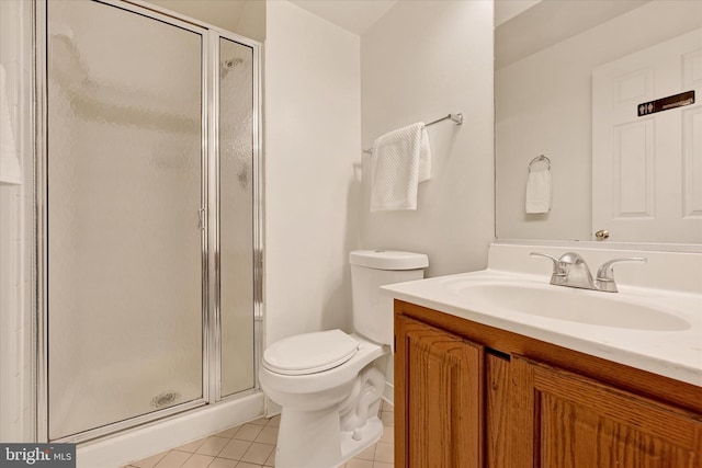 3701 Green Ash Ct, Beltsville, MD 20705 - bathroom featuring tile patterned floors, a shower with shower door, toilet, and vanity