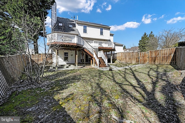 3701 Green Ash Ct, Beltsville, MD 20705 - rear view of house featuring a lawn, a patio, and a deck