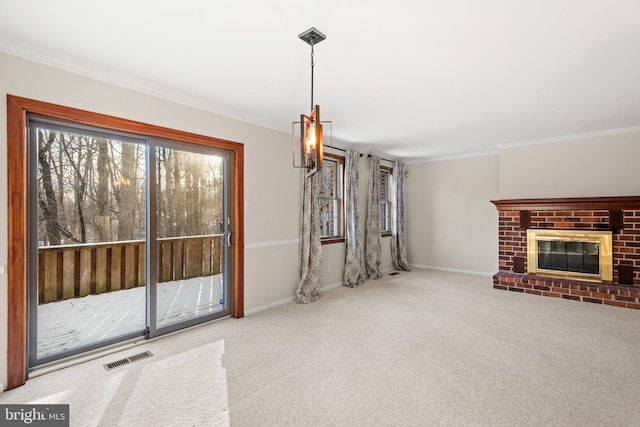 unfurnished living room with carpet flooring, a fireplace, and ornamental molding