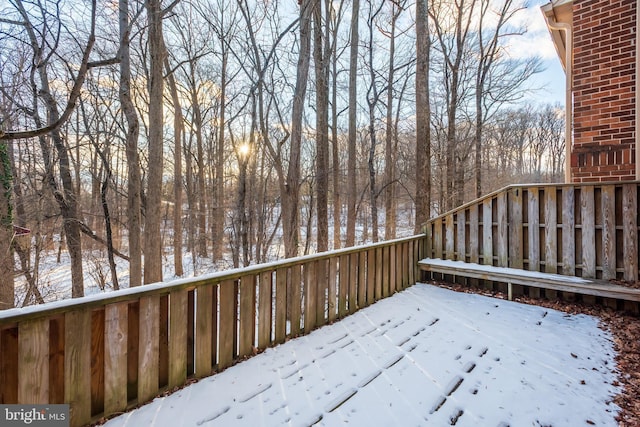 view of snow covered deck