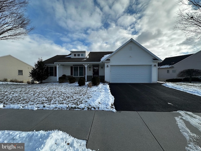 view of front of home with a garage