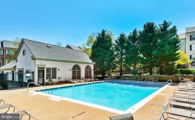 view of pool featuring a patio area