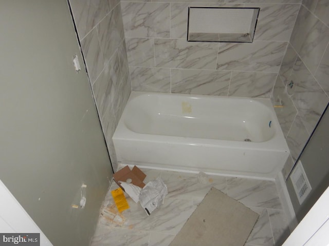 bathroom with a bath