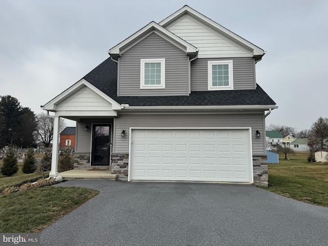 view of front of property featuring a garage