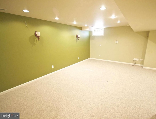 basement featuring carpet floors