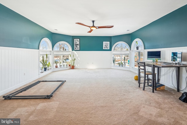 game room with carpet floors and ceiling fan