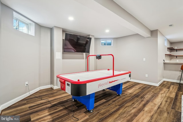 game room with dark hardwood / wood-style flooring