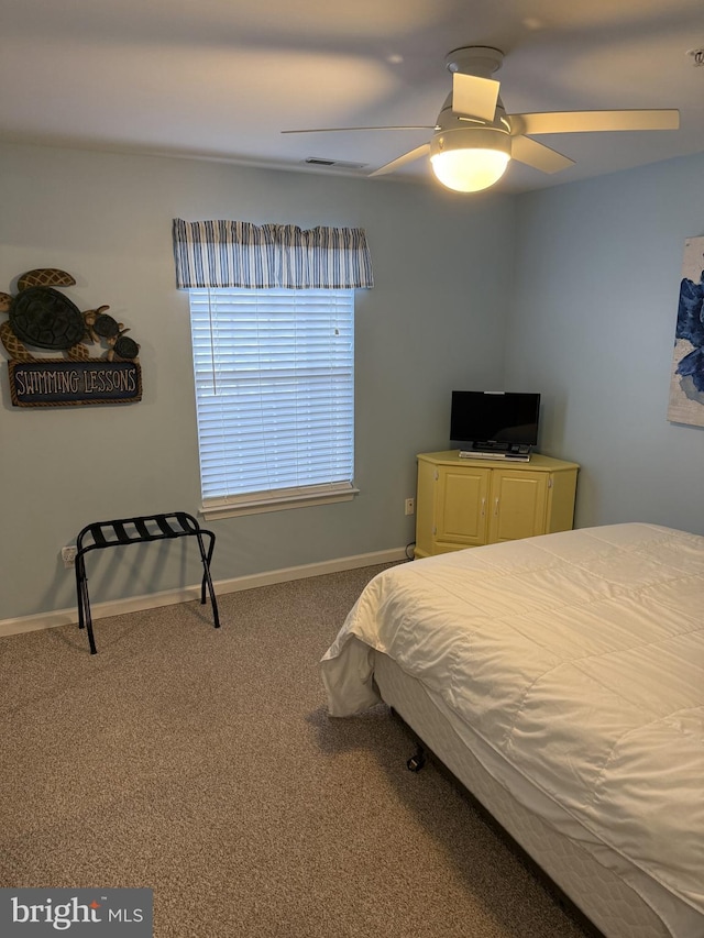 bedroom featuring carpet flooring and ceiling fan