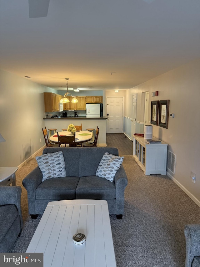 living room featuring carpet flooring