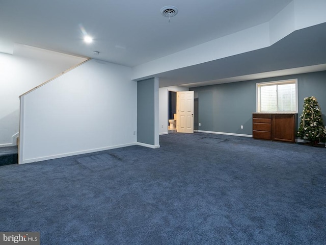 basement with dark colored carpet