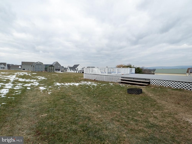 view of yard featuring a wooden deck