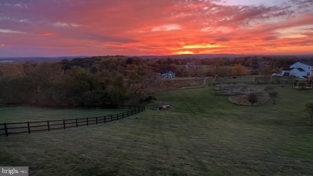 aerial view at dusk with a rural view