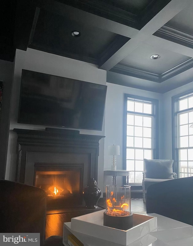 interior space featuring beam ceiling, crown molding, and coffered ceiling