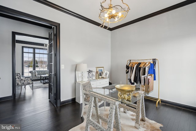 home office with a chandelier, dark wood-type flooring, and crown molding