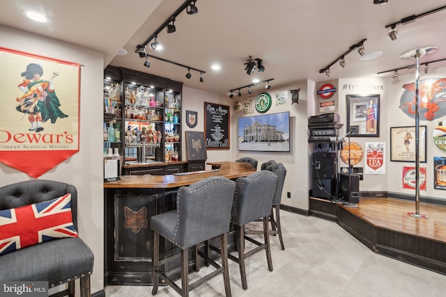 bar featuring butcher block countertops