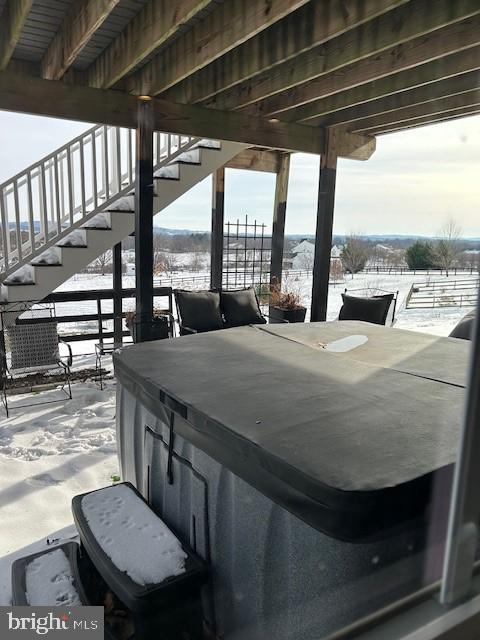 view of snow covered patio