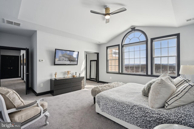 bedroom featuring ceiling fan, carpet floors, and lofted ceiling