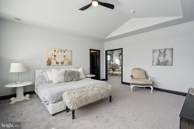 bedroom with carpet flooring, vaulted ceiling, and ceiling fan