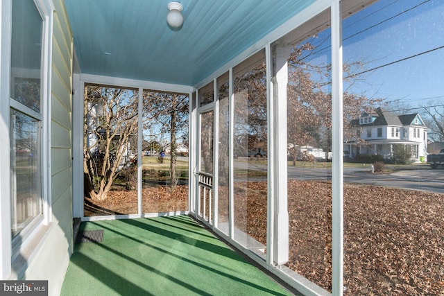 unfurnished sunroom with a healthy amount of sunlight