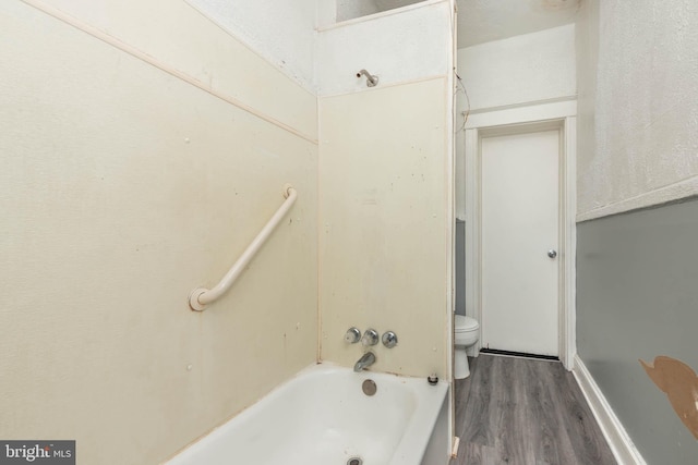 bathroom featuring toilet and wood-type flooring