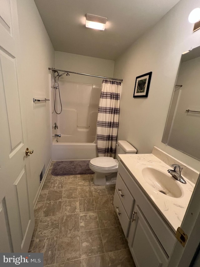 full bathroom featuring vanity, shower / bathtub combination with curtain, and toilet