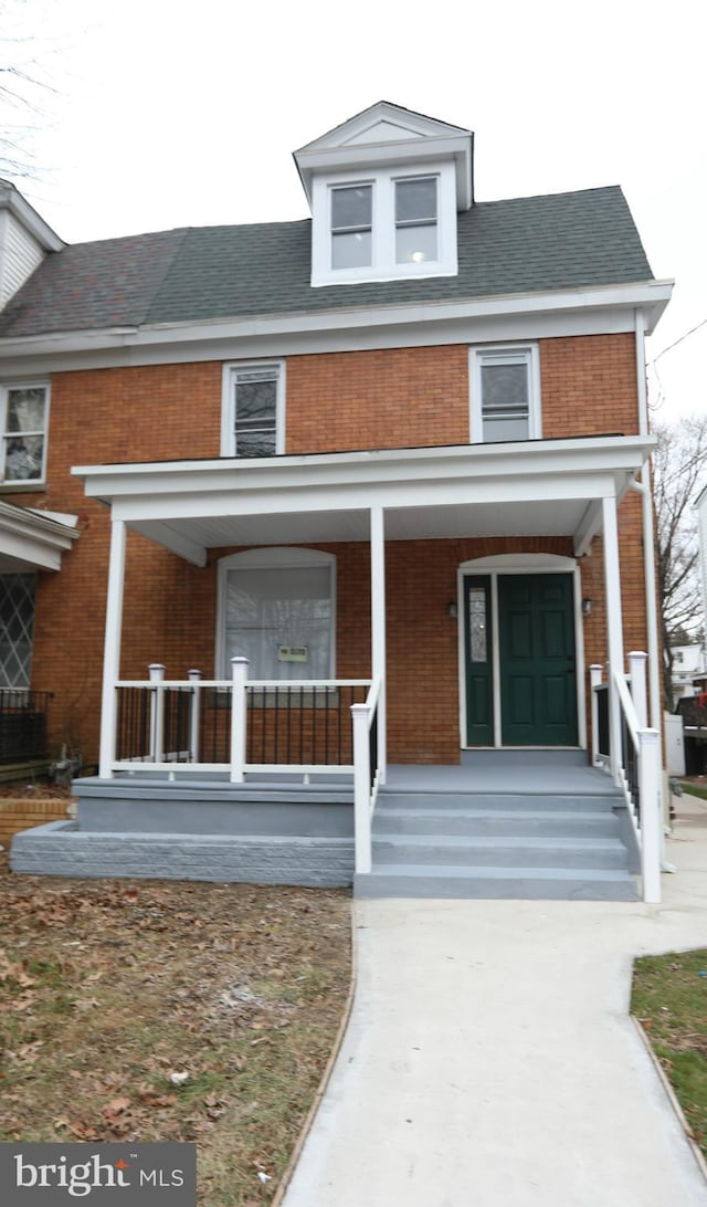 view of front of house with covered porch