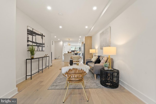 living room with light hardwood / wood-style floors