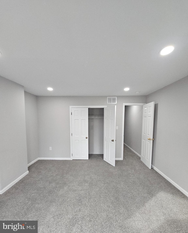 unfurnished bedroom with carpet flooring