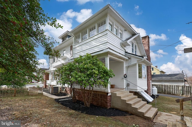 view of property exterior with cooling unit