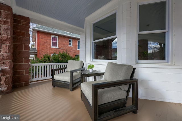 wooden deck featuring a porch