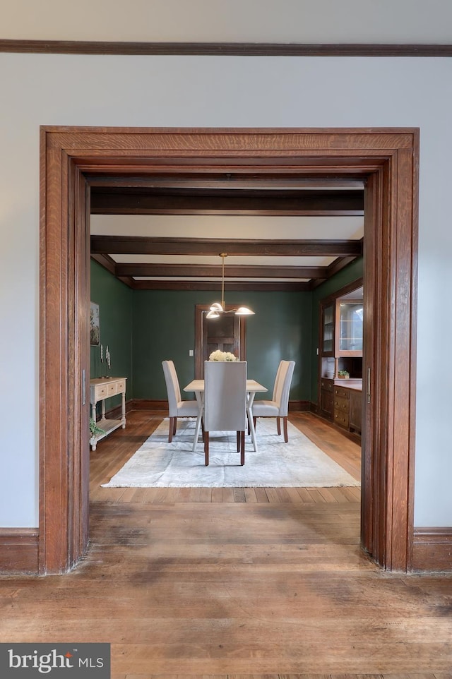 unfurnished dining area with hardwood / wood-style flooring