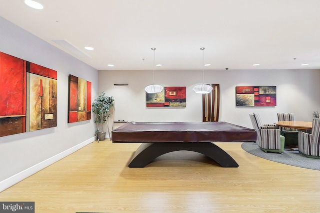 game room featuring pool table and light hardwood / wood-style flooring