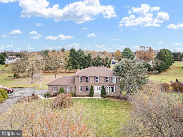 view of front of house with a front lawn