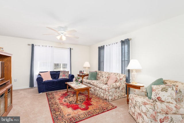 633 E Main St, Fruitland, MD 21826 - living area featuring ceiling fan, baseboards, and light colored carpet
