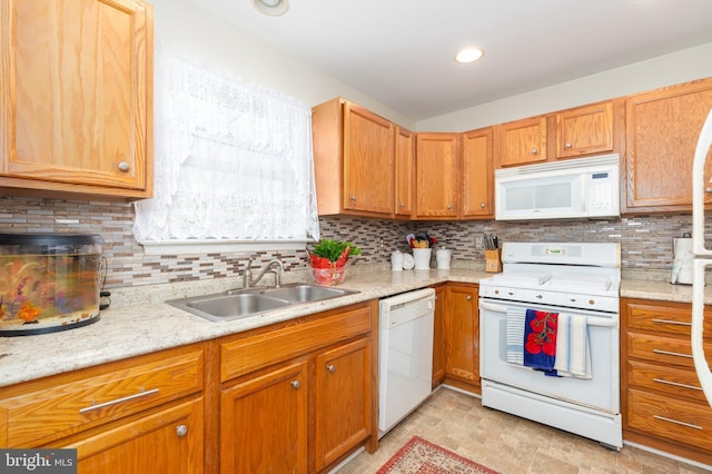 633 E Main St, Fruitland, MD 21826 - kitchen featuring tasteful backsplash, white appliances, light countertops, and a sink