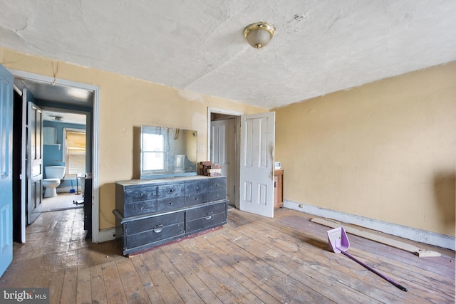 bedroom featuring hardwood / wood-style floors