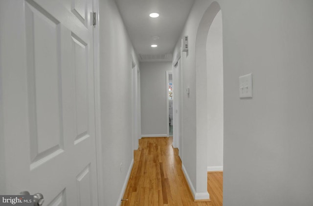 hallway with light wood-type flooring