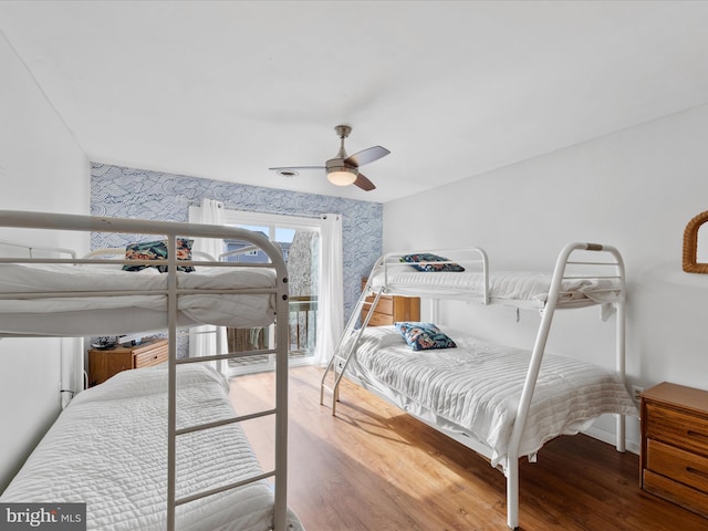 bedroom featuring hardwood / wood-style floors and ceiling fan