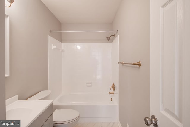 full bathroom featuring shower / bathing tub combination, vanity, and toilet