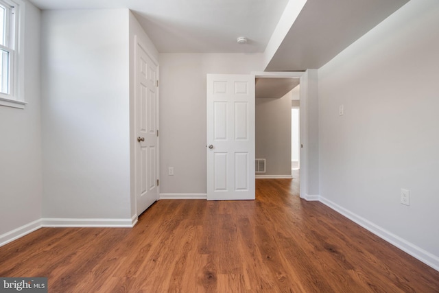 interior space featuring dark wood-type flooring