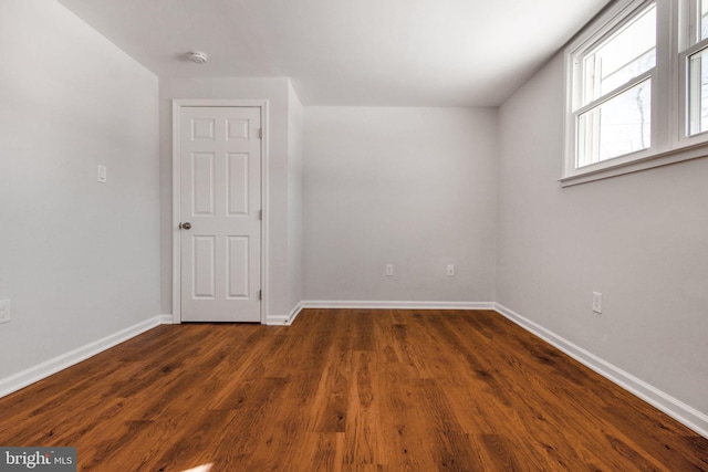 bonus room featuring dark hardwood / wood-style floors