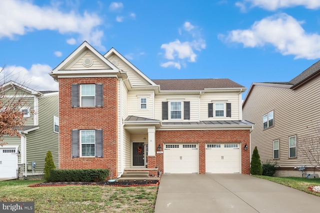 view of front of property with a garage