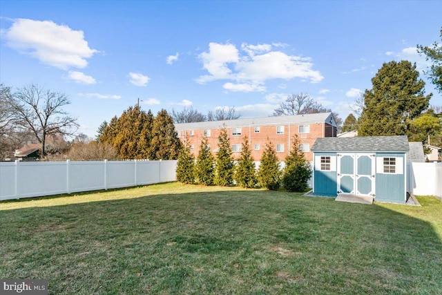 view of yard with a storage shed