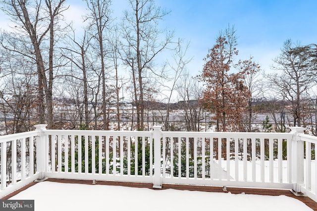 view of snow covered deck