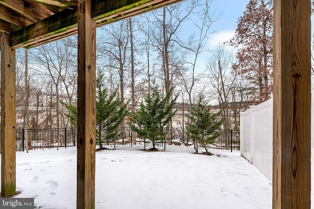 view of yard covered in snow