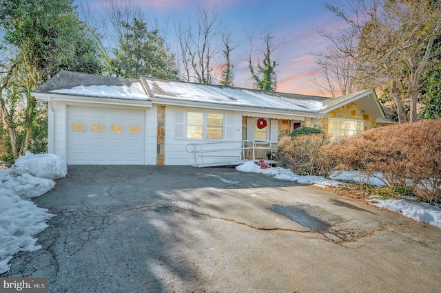 ranch-style house with a garage