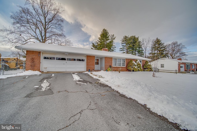 single story home with a garage