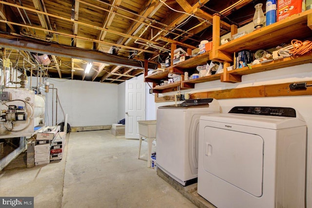 basement with separate washer and dryer